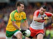 25 May 2014; Karl Lacey, Donegal, in action against Cailean O'Boyle, Derry. Ulster GAA Football Senior Championship Quarter-Final, Derry v Donegal, Celtic Park, Derry. Picture credit: Oliver McVeigh / SPORTSFILE