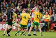 25 May 2014; Mark Lynch, Derry, crowded out by Patrick McBrearty, Darach O'Connor, Karl Lacey and Ryan McHugh, Donegal. Ulster GAA Football Senior Championship Quarter-Final, Derry v Donegal, Celtic Park, Derry. Picture credit: Oliver McVeigh / SPORTSFILE