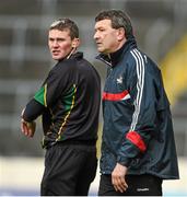 25 May 2014; Cork manager Jimmy Barry Murphy speaks to fourth official John O'Brien during the final moments of the game. Munster GAA Hurling Senior Championship, Quarter-Final, Cork v Waterford, Semple Stadium, Thurles, Co. Tipperary. Picture credit: Diarmuid Greene / SPORTSFILE