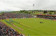 25 May 2014; Donegal and Derry players during the parade before the game. Ulster GAA Football Senior Championship Quarter-Final, Derry v Donegal, Celtic Park, Derry. Picture credit: Oliver McVeigh / SPORTSFILE