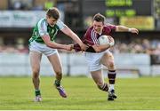 25 May 2014; Danny Cummins, Galway, in action against Philip Butler, London. Connacht GAA Football Senior Championship, Quarter-Final, London v Galway, Emerald Park, Ruislip, London, England. Picture credit: Ray Ryan / SPORTSFILE