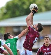 25 May 2014; Fiontan O Curraoin, Galway, in action against Martin Carroll, London. Connacht GAA Football Senior Championship, Quarter-Final, London v Galway, Emerald Park, Ruislip, London, England. Picture credit: Ray Ryan / SPORTSFILE