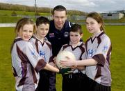 20 April 2006; Armagh footballer Oisin McConville, with from left, Paula Rice, Tiernan Power, Eoin Fox and Hannah McParland at the launch of the Ulster Vhi Cúl Camps. Inter county stars from all over Ulster were present to announce details of the popular Summer Camps which start on July 3rd. The Vhi Cúl Camps are a nationally co-ordinated programme that aims to encourage children to learn and develop sporting and life-skills by particpating in Gaelic Games, in a fun, non-competitive environment. Gaelic Grounds, Armagh. Picture credit: Damien Eagers / SPORTSFILE