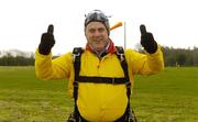 22 April 2006; Noel Grealish T.D, Galway west gives the thumbs up after landing safely during a tandem parachute jump in aid of the Alan Kerins African Projects, Irish Parachute Club, Clonbullogue, Co. Offaly. Picture credit: Damien Eagers / SPORTSFILE