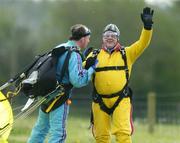 22 April 2006; Noel Grealish, T.D, Galway west celebrates after landing safely with the help of John Byrnes, tandem master in support of the Alan Kerins African Projects, Irish Parachute Club, Clonbullogue, Co. Offaly. Picture credit: Damien Eagers / SPORTSFILE
