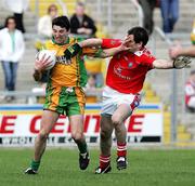 23 April 2006; Michael Hegarty, Donegal, in action against Peter McGinnity, Louth. Allianz National Football League, Division 2 Final, Donegal v Louth, Kingspan Breffni Park, Cavan. Picture credit: Oliver McVeigh / SPORTSFILE