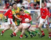 23 April 2006; Christy Toye, Donegal, in action against Mark Stanfield, Louth. Allianz National Football League, Division 2 Final, Donegal v Louth, Kingspan Breffni Park, Cavan. Picture credit: Oliver McVeigh / SPORTSFILE