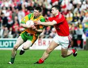 23 April 2006; Ciaran Bonner, Donegal, in action against Colin Goss, Louth. Allianz National Football League, Division 2 Final, Donegal v Louth, Kingspan Breffni Park, Cavan. Picture credit: Oliver McVeigh / SPORTSFILE