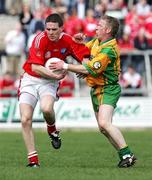 23 April 2006; Brian Roper, Donegal, in action against Jamie Carr, Louth. Allianz National Football League, Division 2 Final, Donegal v Louth, Kingspan Breffni Park, Cavan. Picture credit: Oliver McVeigh / SPORTSFILE