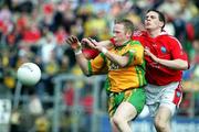 23 April 2006; Brian Roper, Donegal, in action against Jamie Carr, Louth. Allianz National Football League, Division 2 Final, Donegal v Louth, Kingspan Breffni Park, Cavan. Picture credit: Oliver McVeigh / SPORTSFILE