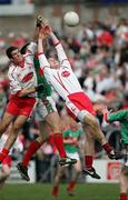23 April 2006; Justin McMahon and Michael Murphy, Tyrone, in action against Barry Moran, Mayo. Cadbury's All-Ireland U21 Football Championship Semi-Final, Mayo v Tyrone, Kingspan Breffni Park, Cavan. Picture credit: Oliver McVeigh / SPORTSFILE