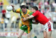 23 April 2006; Ciaran Bonner, Donegal, in action against Colin Goss, Louth. Allianz National Football League, Division 2 Final, Donegal v Louth, Kingspan Breffni Park, Cavan. Picture credit: Oliver McVeigh / SPORTSFILE