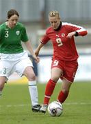 22 April 2006; Vanessa Burki, Switzerland, in action against Sharon Boyle, Republic of Ireland. World Cup Qualifier, Republic of Ireland v Switzerland, Richmond Park, Dublin. Picture credit: Ray Lohan / SPORTSFILE