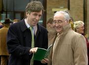 25 April 2006; FAI Chief Executive John Delaney, left, checks the race card with FAI President David Blood at the Punchestown National Hunt Festival. Punchestown Racecourse, Co. Kildare. Picture credit: Pat Murphy / SPORTSFILE