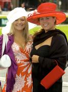 25 April 2006; Laura Carroll, left, from Limerick, with Jacqueline Collopy, from Clare, at the Punchestown National Hunt Festival. Punchestown Racecourse, Co. Kildare. Picture credit: Pat Murphy / SPORTSFILE