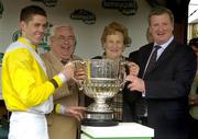 25 April 2006; Winning connections, from left, jockey Andrew McNamara, Batty and Mary Hayes, owner, and John Joseph Murphy, trainer, celebrate after Newmill won the Kerrygold Champion Steeplechase. Punchestown Racecourse, Co. Kildare. Picture credit: Pat Murphy / SPORTSFILE
