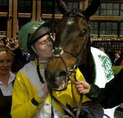 25 April 2006; Jockey Andrew McNamara kisses his mount Newmill after winning the Kerrygold Champion Steeplechase. Punchestown Racecourse, Co. Kildare. Picture credit: Pat Murphy / SPORTSFILE