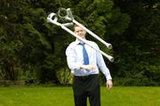 26 April 2006; St Patrick's Athletic player Colm Foley throws away his crutches after he had recovered from cruciate ligament injury. Spa Hotel, Lucan, Dublin Picture credit: Matt Browne / SPORTSFILE