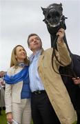 26 April 2006; Owners Michael O'Leary and his wife Anita with War Of Attrition after winning the Punchestown Guinness Gold Cup. Punchestown Racecourse, Co. Kildare. Picture credit: Brian Lawless / SPORTSFILE