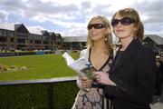 27 April 2006; Aoife Smullen, left, from Twomilehouse, Naas, Co. Kildare, with Kathy Flanagan, from Kildare Town, before the start of the days racing. Punchestown Racecourse, Co. Kildare. Picture credit: Brian Lawless / SPORTSFILE