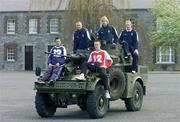 26 April 2006; St Patrick's Athletic players Barry Ryan, left, Glen Larsen, centre, and Paul Keegan sit on a AML 20 with supporters Joseph Kavangh, left, and Mark Purcell at a photocall ahead of St Patrick's Athletic's eircom Premier Division game against Cork City this weekend. Cathal Brugha Army Barracks, Rathmines, Dublin. Picture credit: Damien Eagers / SPORTSFILE