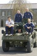 26 April 2006; St Patrick's Athletic players, from left to right, Chris Armstrong, Barry Ryan, John Frost, Glen Larsen and Paul Keegan sit on a AML 20 with Trooper Derek Moore at a photocall ahead of St Patrick's Athletic's eircom Premier Division game against Cork City this weekend. Cathal Brugha Army Barracks, Rathmines, Dublin. Picture credit: Damien Eagers / SPORTSFILE