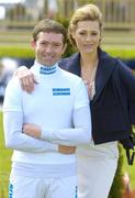 28 April 2006; Jockey Conor O'Dwyer with supermodel Jasmin Le Bon before the start of the days racing. Punchestown Racecourse, Co. Kildare. Picture credit: Pat Murphy / SPORTSFILE