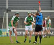 24 May 2014; Conor Hickey, centre, London, is shown the red card and sent off by referee Eamonn Hassan. GAA Leinster Senior Hurling Championship Qualifier Group, Round 5, Westmeath v London, Cusack Park, Mullingar, Co. Westmeath. Picture credit: Piaras Ó Mídheach / SPORTSFILE