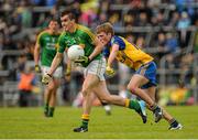 18 May 2014; Paddy Maguire, Leitrim, in action against Ronan Stack, Roscommon. Connacht GAA Football Senior Championship Quarter-Final, Roscommon v Leitrim, Dr. Hyde Park, Roscommon. Picture credit: Piaras Ó Mídheach / SPORTSFILE