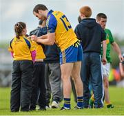 18 May 2014; Senan Kilbride, Roscommon, signs autographs for children after the game. Connacht GAA Football Senior Championship Quarter-Final, Roscommon v Leitrim, Dr. Hyde Park, Roscommon. Picture credit: Piaras Ó Mídheach / SPORTSFILE