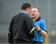24 May 2014; Referere Eamonn Hassan, right, in conversation with linesman Christy Browne. GAA Leinster Senior Hurling Championship Qualifier Group, Round 5, Westmeath v London, Cusack Park, Mullingar, Co. Westmeath. Picture credit: Piaras Ó Mídheach / SPORTSFILE