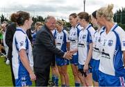 10 May 2014; Pat Quill, President of the Ladies Gaelic Football Association, is introduced to the Waterford team by captain Michelle McGrath, left. TESCO Ladies National Football League Division 3 Final, Armagh v Waterford, Parnell Park, Dublin. Picture credit: Barry Cregg / SPORTSFILE