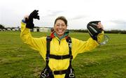 22 April 2006; Alan's sister Mirium celebrates after landing safely after a tandem parachute jump in aid of the Alan Kerins African Projects, Irish Parachute Club, Clonbullogue. Picture credit: Damien Eagers / SPORTSFILE