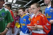 25 April 2006; At the announcment by Kellogg's of a joint initiative with the Gaelic Athletic Association to offer an exclusive range of specially commissioned breakfast bowls designed in the 32 county colours are young GAA players representing the 32 counties, including Cian Malone, Longford, and Conor Gibney, Derry. Croke Park, Dublin. Picture credit: David Maher / SPORTSFILE