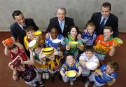 25 April 2006; At the announcment by Kellogg's of a joint initiative with the Gaelic Athletic Association to offer an exclusive range of specially commissioned breakfast bowls designed in the 32 county colours are, GAA President Nickey Brennan with Stephen Twaddell, left, Managing director Kellogg's, Noel Hegarty, Marketing director Kellogg's and young GAA players representing Leinster, middle row left to right, Erin O'Reilly, Louth, Gary Foley, Wexford, Kevwe Marks, Laois, Noelle O'Donnell, Meath, Cian Lenihan, Dublin and Laura Heffernan, Carlow. Front row from left to right, Joseph Ryan, Westmeath, Catriona Kenny, Offaly, Daire Kinsella, Kilkenny, Cian Malone, Longford, Sam Verdon, Kildare and Joseph Beauchamp, Wicklow. Croke Park, Dublin. Picture credit: David Maher / SPORTSFILE