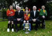 26 April 2006; Junior whistlers, from left, Daryl Sherwin, Laura Toner, front, Nicola Carroll and Craig Geurin, with Kilkenny manager Brian Cody and Limerick manager Joe McKenna at a press conference ahead of this weekend's Allianz National Hurling League Division 1 and Division 2 Finals. Allianz National Hurling League Finals Press Conference, Berkley Court Hotel, Dublin. Picture credit: David Maher / SPORTSFILE