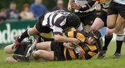 29 April 2006; Aidan McNulty, Young Munster, is tackled by Steve Rockett, Old Belvedere. AIB League, Division 2. Young Munster v Old Belvedere, Anglesea Road, Dublin. Picture credit: David Levingstone / SPORTSFILE