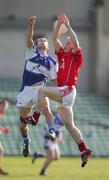 29 April 2006; Cathal Ryan, Laois, in action against Caragh Keane, Cork. Cadbury's U21 Football Semi-final Replay. Laois v Cork, Gaelic Grounds, Limerick. Picture credit: Kieran Clancy / SPORTSFILE