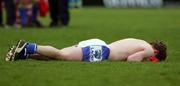 29 April 2006; A dejected Laois player at the end of the game. Cadbury's U21 Football Semi-final Replay. Laois v Cork, Gaelic Grounds, Limerick. Picture credit: Kieran Clancy / SPORTSFILE