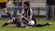 29 April 2006; Felipe Contepomi, Leinster, touches down for his side's second try depite the tackle from Jonathon Thomas, Ospreys. Celtic League, Leinster v Ospreys, Lansdowne Road, Dublin. Picture credit: Damien Eagers / SPORTSFILE