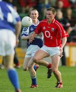 29 April 2006; Peter O'Leary, Laois, in action against Patrick Kelly, Cork. Cadbury's U21 Football Semi-final Replay. Laois v Cork, Gaelic Grounds, Limerick. Picture credit: Kieran Clancy / SPORTSFILE