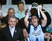 30 April 2006;  Dublin captain Philip Brennan celebrates at the end of the game after being presented with the Diviision 2 trophy by GAA President Nickey Brennan. Allianz National Hurling League, Division 2 Final. Dublin v Kerry, Semple Stadium, Thurles, Co. Tipperary. Picture credit: David Maher / SPORTSFILE