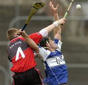 30 April 2006; Darren Rooney, Laois, in action against Seamus Roddy, Down. National Hurling League, Division 1 Relegation Final. Laois v Down, Pairc Tailteann, Navan, Co. Meath. Picture credit: Brian Lawless / SPORTSFILE