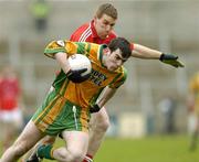 30 April 2006; Michael Doherty, Donegal, in action against David Brennan, Louth. National Football League, Division 2 Final. Donegal v Louth, Kingspan Breffni Park, Co. Cavan. Picture credit: Matt Browne / SPORTSFILE
