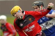 30 April 2006; Brendan McGourty, Down, in action against Pakie Cuddy, Laois. National Hurling League, Division 1 Relegation Final. Laois v Down, Pairc Tailteann, Navan, Co. Meath. Picture credit: Brian Lawless / SPORTSFILE