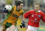 30 April 2006; Rory Kavanangh, Donegal, in action against John Neary, Louth. National Football League, Division 3 Final. Donegal v Louth, Kingspan Breffni Park, Co. Cavan. Picture credit: Matt Browne / SPORTSFILE