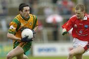 30 April 2006; Rory Kavanangh, Donegal, in action against John Neary, Louth. National Football League, Division 3 Final. Donegal v Louth, Kingspan Breffni Park, Co. Cavan. Picture credit: Matt Browne / SPORTSFILE