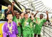 28 May 2014; The St. Patrick’s NS, Galway, team celebrate with the cup after winning Section C Aviva Health FAI Primary School 5’s National Finals, Aviva Stadium, Lansdowne Road, Dublin. Picture credit: Pat Murphy / SPORTSFILE