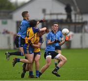 3 May 2014; Brian Fenton, extreme right, Dublin, gathers possession supported by team-mate Paul Mannion, extreme left, in action against David Murray, 4, and John McManus, Roscommon. Cadbury GAA Football All-Ireland U21 Championship Final, Dublin v Roscommon, O'Connor Park, Tullamore, Co. Offaly. Picture credit: Ray McManus / SPORTSFILE
