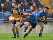 3 May 2014; Ronan Daly, Roscommon, in action against Cormac Costello, centre, Dublin, and Niall Scully. Cadbury GAA Football All-Ireland U21 Championship Final, Dublin v Roscommon, O'Connor Park, Tullamore, Co. Offaly. Picture credit: Ray McManus / SPORTSFILE